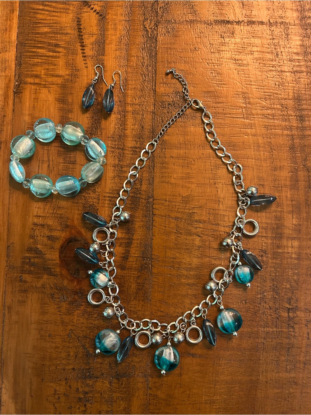 Silver Charm Necklace, Bracelet and Earring Set in Aqua Blue